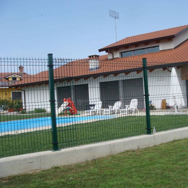 Green welded mesh fences are installed surround the villa.