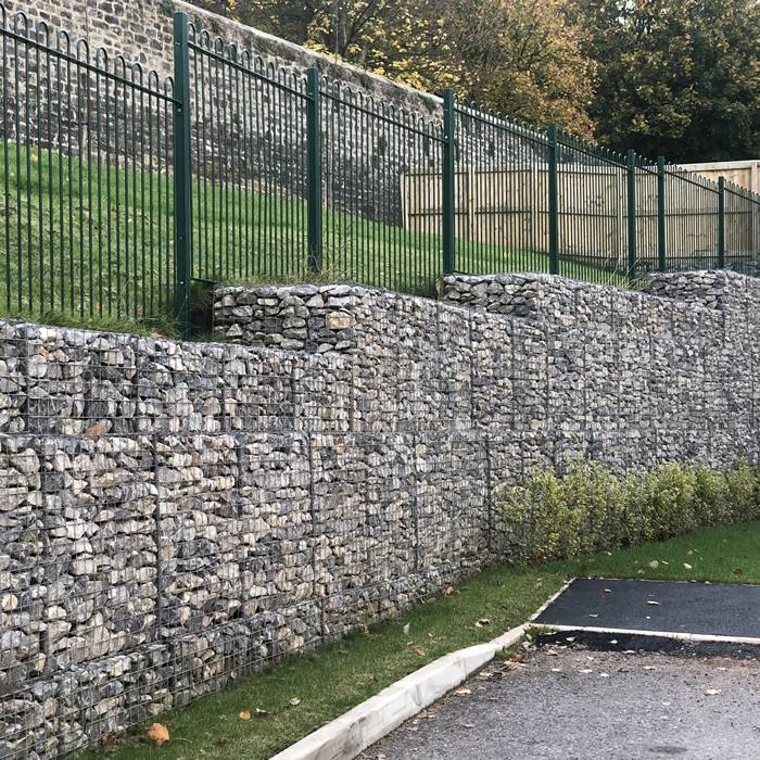 Several layers of welded gabions are installed as foundation.